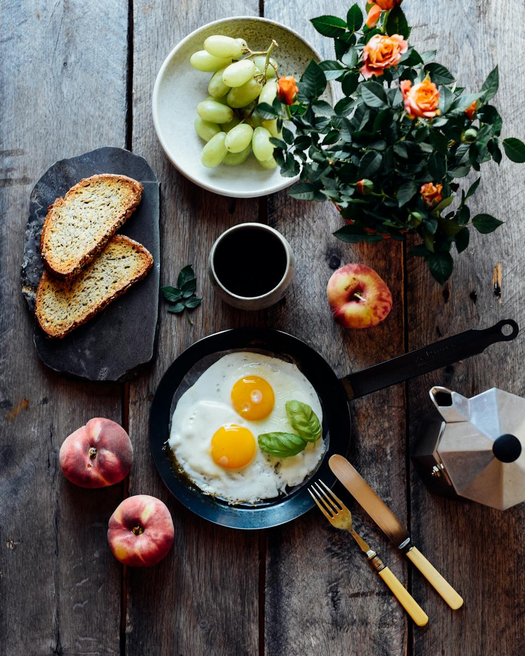 fresh breakfast on decorated table at home